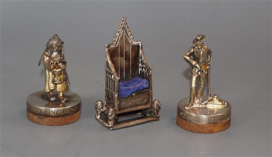 An Edwardian silver Coronation chair pin cushion, Birmingham, 1901 and two modern silver gilt figures.